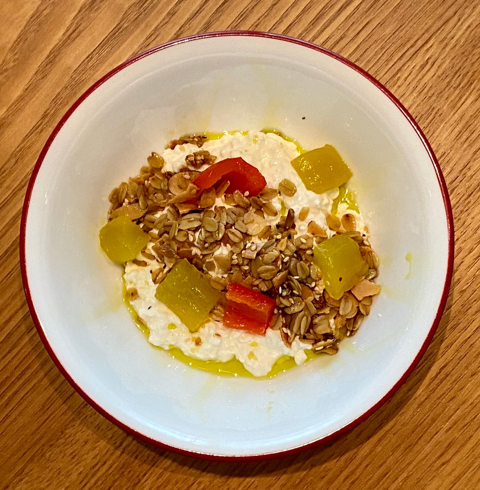 Nocellara Savory Granola with Soft Cheese and Sweet Pickles