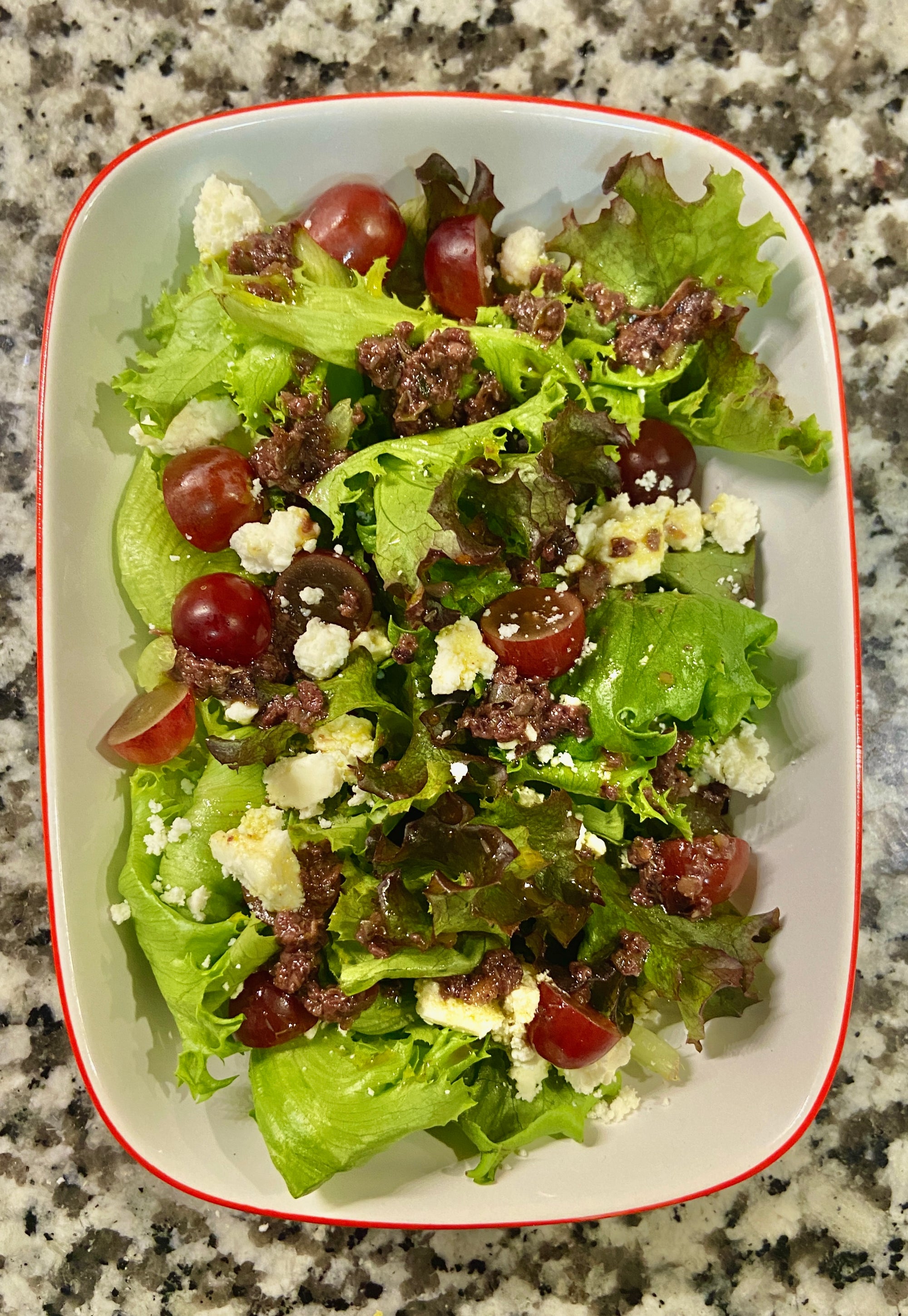 Mixed Greens, Red Grapes, Ricotta Salata Salad with Tapenade Vinaigrette